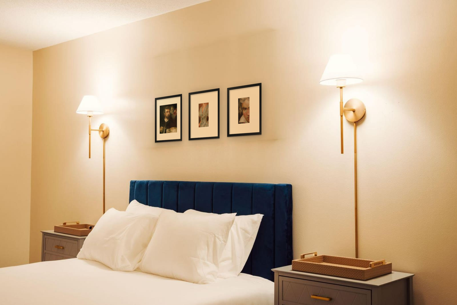 Mrs Henry White, art print after John Singer Sargent by Riya Kumari, framed above a hotel bed, with two other prints