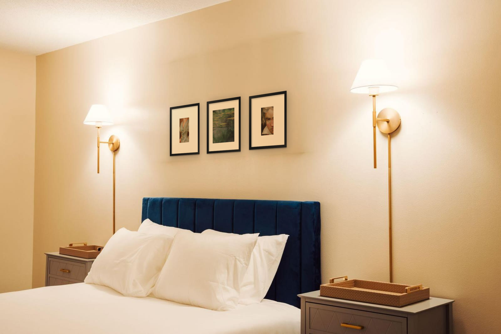 Water Lilies, art print after Claude Monet by Riya Kumari, framed above a hotel bed, with two other prints